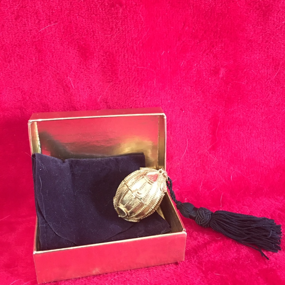 Estée Lauder perfume gold ball with tassel decor and purfume!
